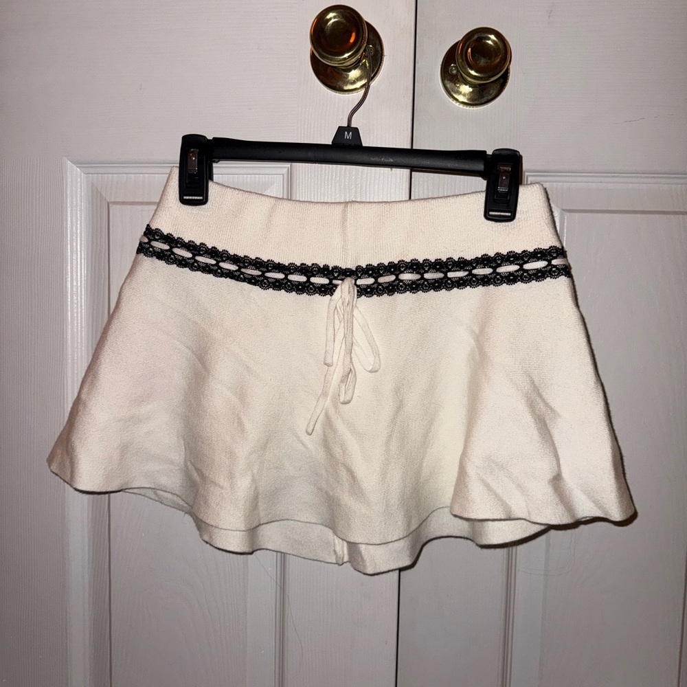 Edikted Cream Mini Skirt with Black Lace Accent